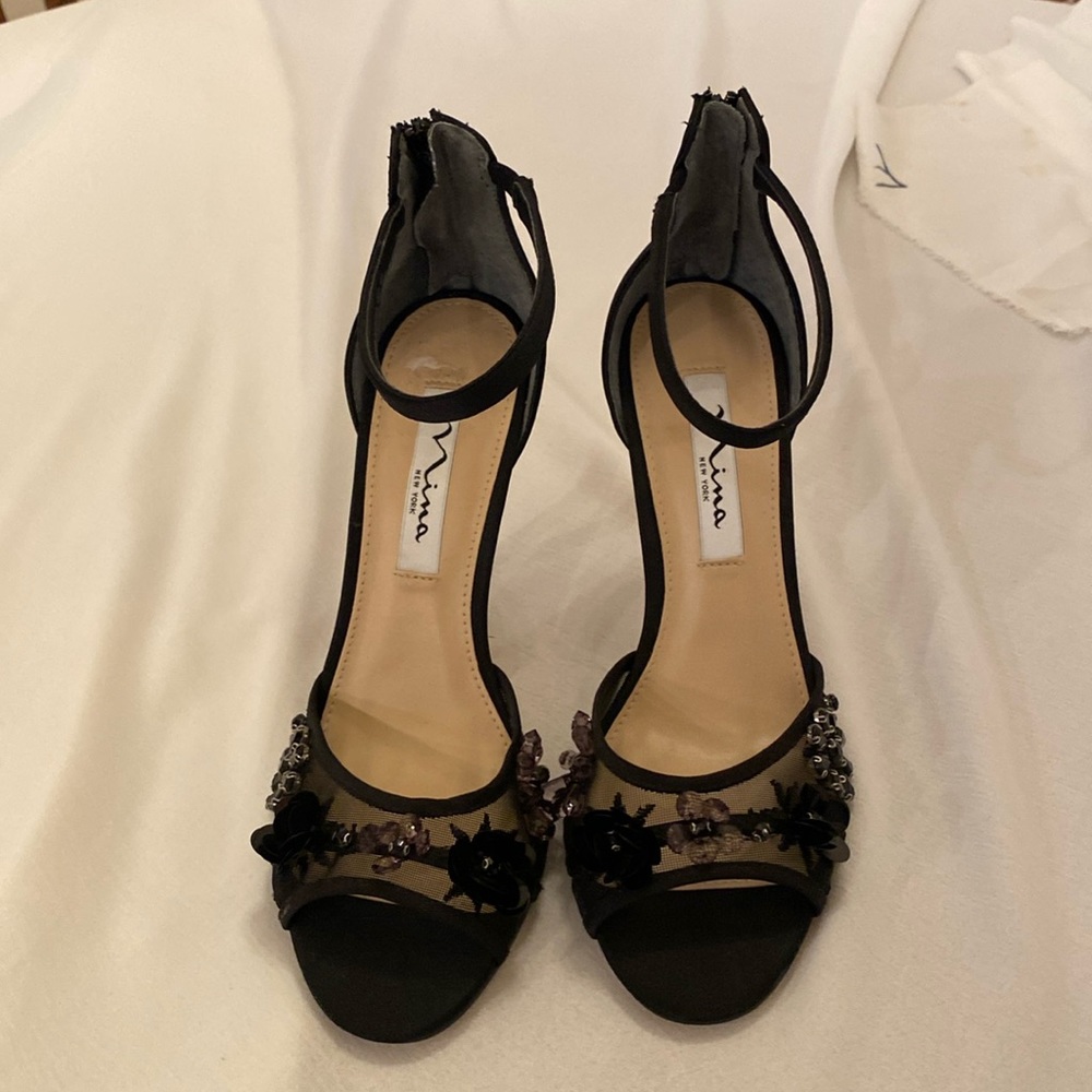 Nina brand new, never used. Leather sole. Size 7